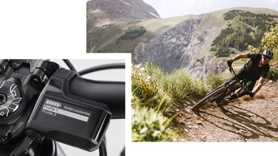 Close-up of a bike's control panel and a person mountain biking on a scenic trail