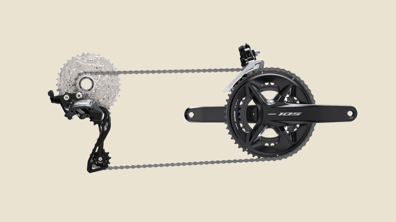 Shimano 105 bike drivetrain components including crankset, chain, and rear derailleur