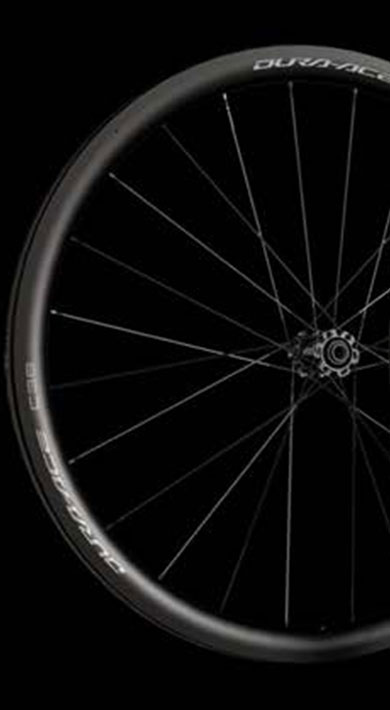 Three bicycle wheels with Dura-Ace C60 branding against a black background