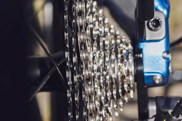 Close-up of a bicycle's rear derailleur and cassette gears
